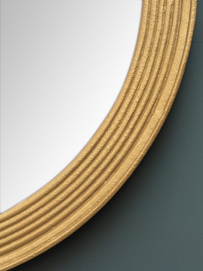 Grand miroir rond contour ligné doré